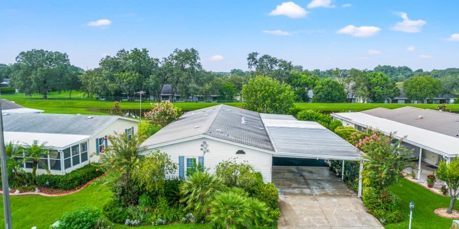 Beautiful Tampa home with lush landscaping and spacious driveway for sale.